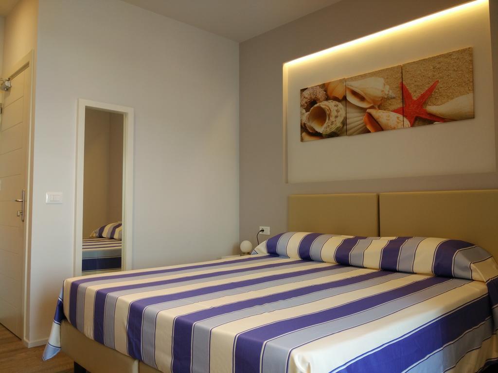 Hotel L'Approdo Порт-Аццурро Номер фото