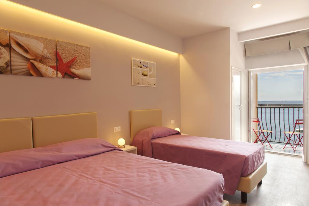 Hotel L'Approdo Порт-Аццурро Номер фото